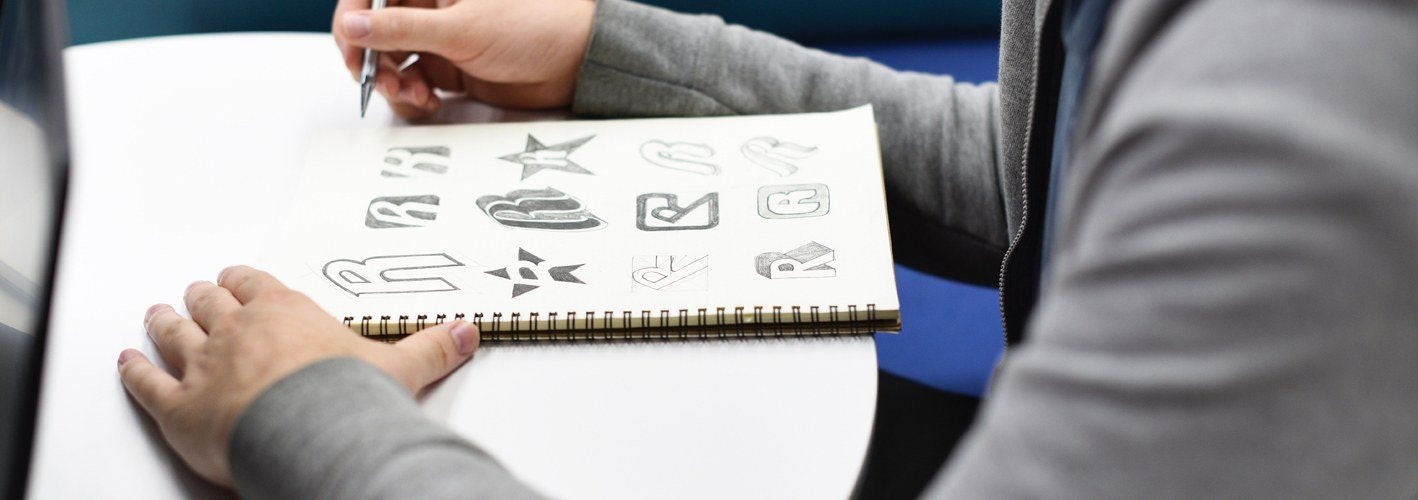 marketer designing logos